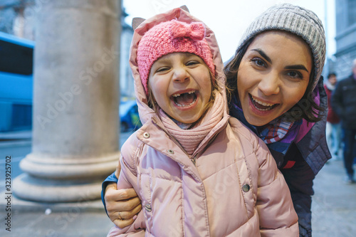 Photography laughing mother and daughter