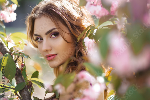 Woman at Blossoming Sakura Tree on Nature
