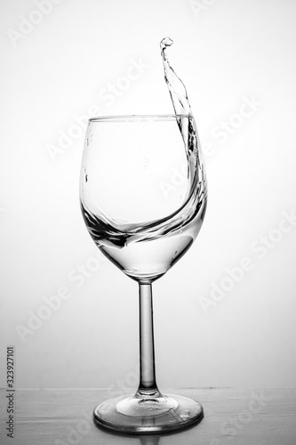 Glass with water up and splash