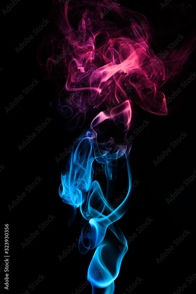 Fototapeta premium Colored smoke on black background