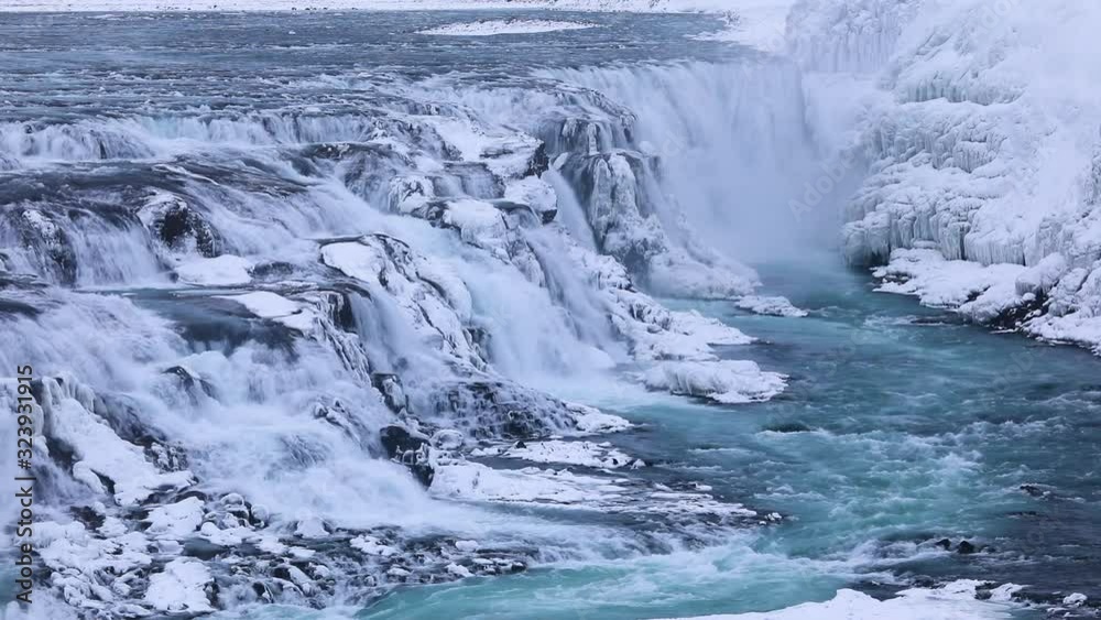 The famous Gullfoss waterfall in the winter at dawn. One of the most popular places in Iceland The famous Gullfoss waterfall in the winter at dawn. One of the most popular places in Iceland