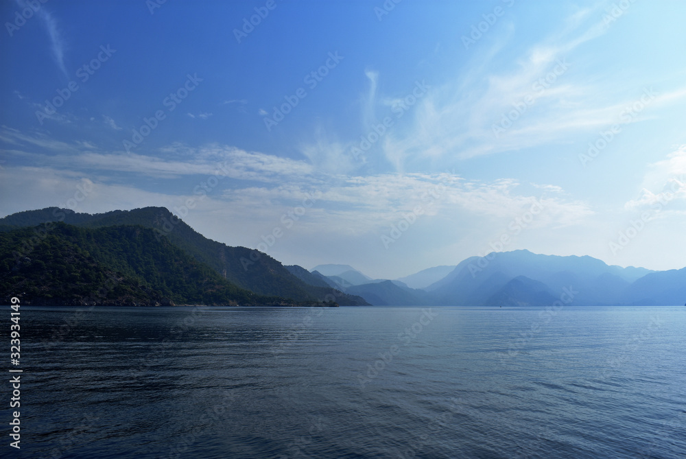 blue water, blue sky, mountains. aegean. Turkey
