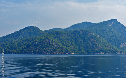 blue water, blue sky, mountains. aegean. Turkey