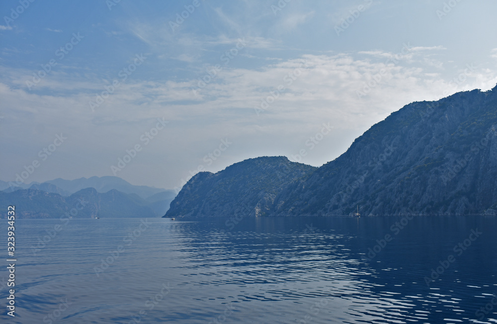 blue water, blue sky, mountains. aegean. Turkey