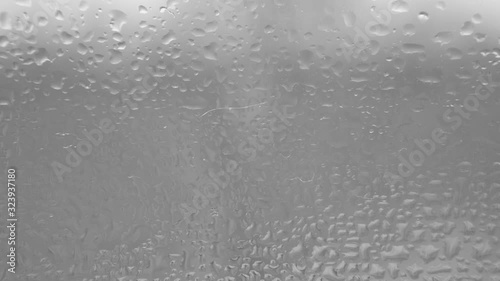 Appearing Moisture on a Window Drops Rain Raining Wet Glass Droplet Condensation