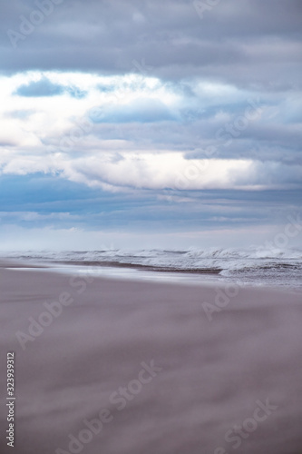 Fototapeta Naklejka Na Ścianę i Meble -  Vacant Empty Beach During Winter Storm