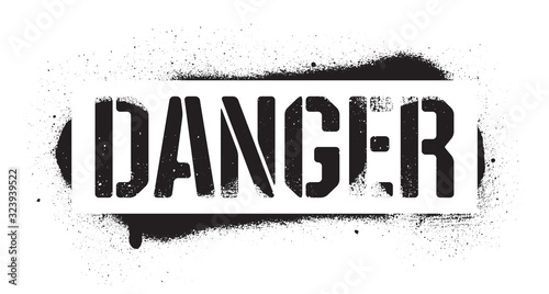 Stencil Danger inscription. Black graffiti print on white background. Vector design street art