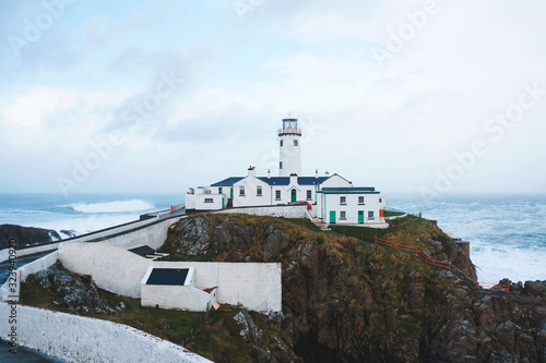 white fanad lighthouse on mountain