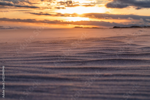 Beach Sand Close Up with Sunset Landscape