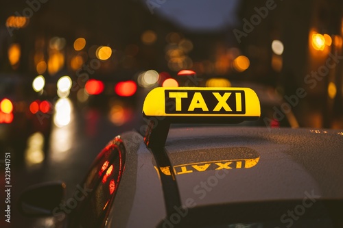 Fotobehang Taxi sign on car during night