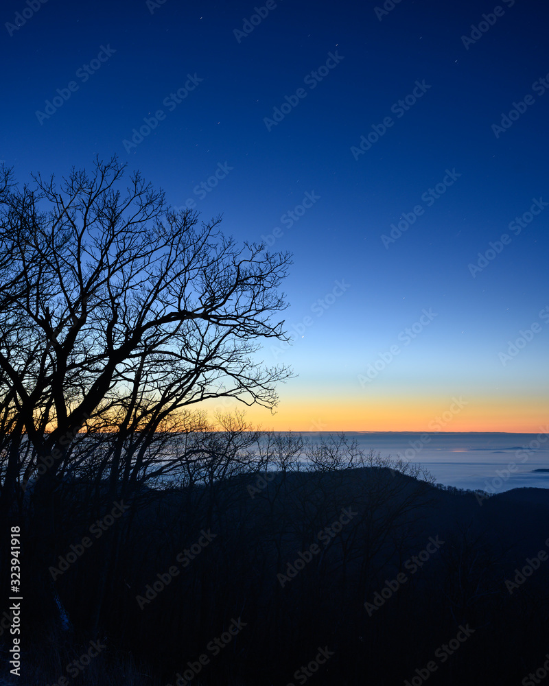 Fototapeta premium Jupiter and Fog Covered Virginia Piedmont Before a Winter Dawn