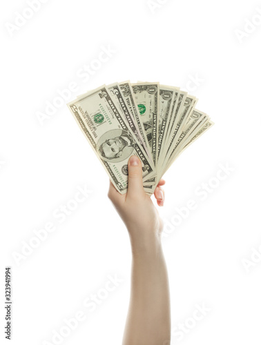 Cash 5 and 1 US Dollars banknotes in human hands isolated on white background