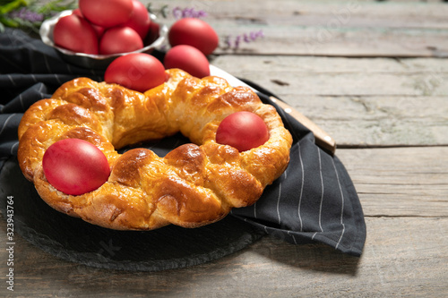Tasty easter bread. Easter bread and red eggs. Italian easter bread