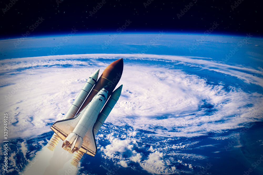 Naklejka premium Rocket and stars. Flight of spaceship in outer space. The elements of this image furnished by NASA.