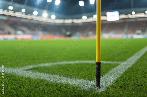 Close up flag's pole in the corner of soccer pitch