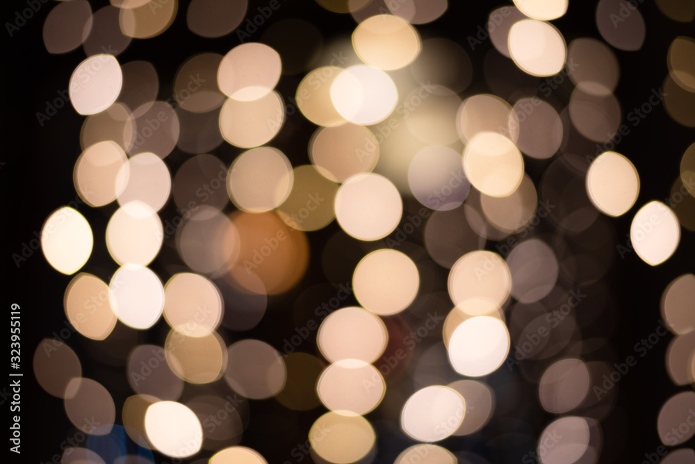 Defocused abstract beige and brown bokeh lights background. Holidays concept. Defocused abstract beige and brown bokeh lights background. Holidays concept.
