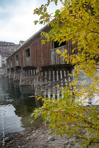 Historic wooden bridge between Germany and Switzerland Germany, Baden Wuerttemberg, Historic wooden bridge over River Rhine from Gailingen to Diessenhofen (Switzerland).