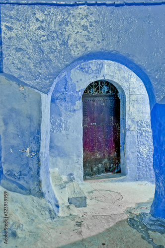 Night on city streets of Chefchaouen, Morocco photo