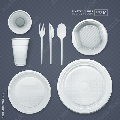 Set of realistic plastic dishes on a gray background. Classic white disposable tableware.