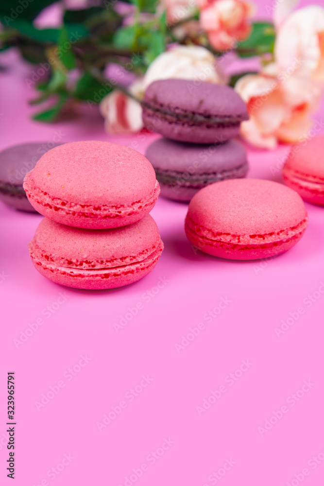 Fototapeta premium Macaroons on a pink background.