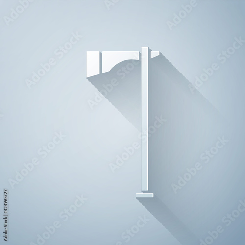 Paper cut Native american tomahawk axe icon isolated on grey background. Paper art style. Vector Illustration