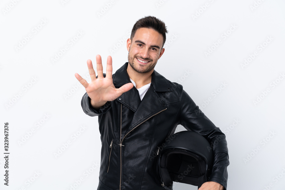 Man with a motorcycle helmet counting five with fingers Man with a motorcycle helmet counting five with fingers