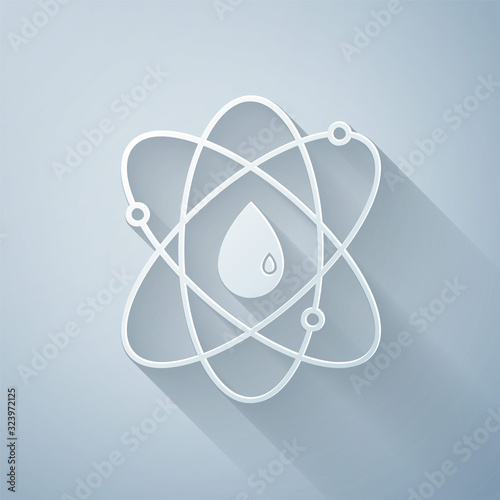 Paper cut Atom icon isolated on grey background. Symbol of science, education, nuclear physics, scientific research. Paper art style. Vector Illustration