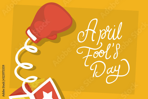 happy april fools day card with surprise box and boxing glove