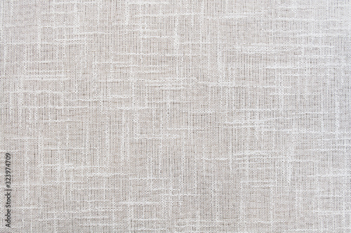 Closeup white,beige,light grey color fabric sample texture backdrop.White fabric strip line pattern design,upholstery for decoration interior design or abstract background.