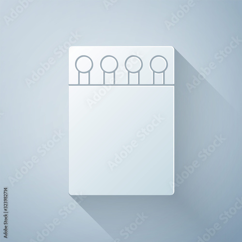 Paper cut Open matchbox and matches icon isolated on grey background. Paper art style. Vector Illustration