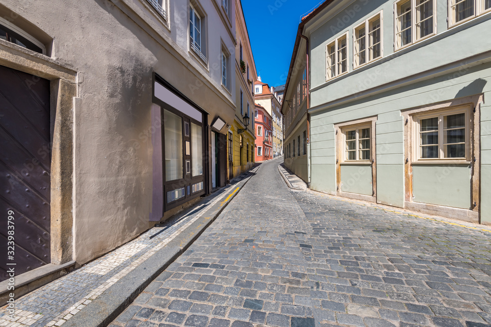 View to the street in the old center of Prague - the capital and largest city of the Czech Republic - travel background