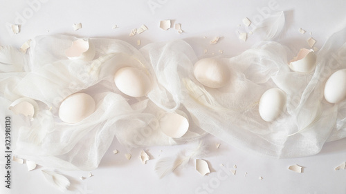Totally white. Easter eggs on a white cloth. Egg shell. Easter concept