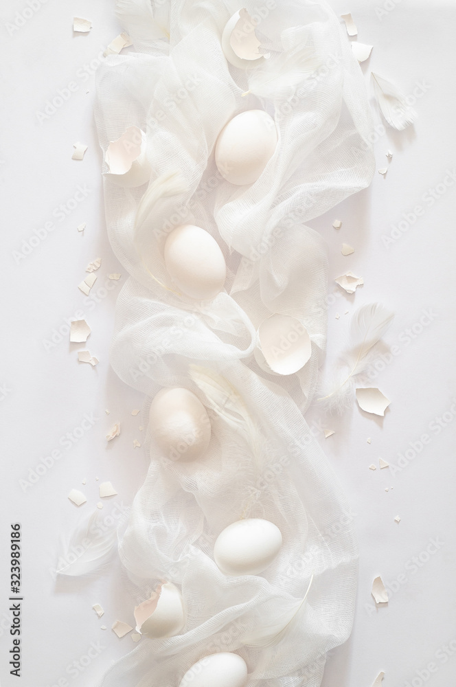 Totally white. Easter eggs on a white cloth. Egg shell. Easter concept Totally white. Easter eggs on a white cloth. Egg shell. Easter concept