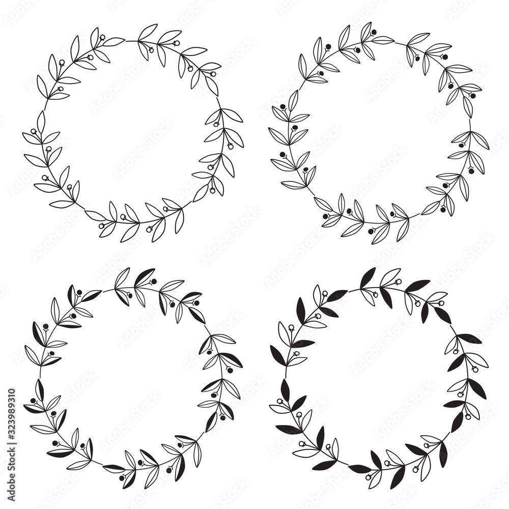 Wreaths of leaves and branches. Set of four black and white vector round floral frames isolated on a white background. Wreaths of leaves and branches. Set of four black and white vector round floral frames isolated on a white background.