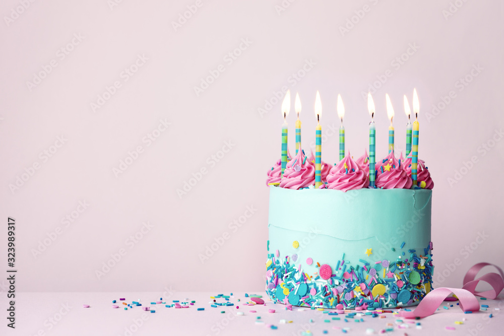 Birthday cake with sprinkles and buttercream swirls Stock Photo | Adobe ...