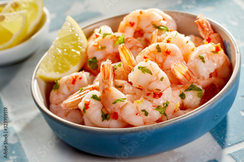 Canvas Print Bowl of fresh sauteed scampi seasoned with herbs