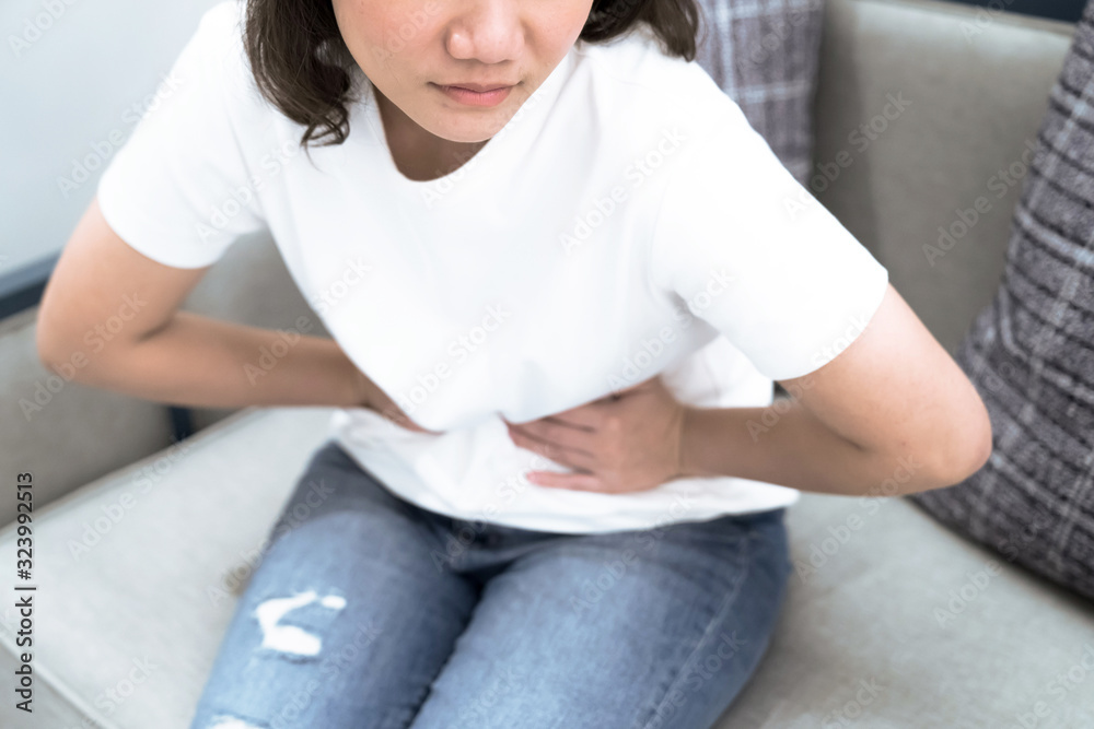 Young women suffer from nausea and vomiting from gastritis. Young women suffer from nausea and vomiting from gastritis.