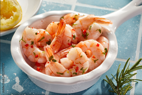 White pannikin with grilled fresh scampi photo