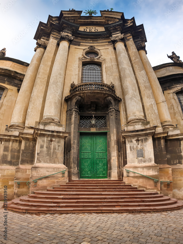 Beautiful panoramic image of entrance door and stone stairs at the old dominican cathedral at Lviv, Ukraine
