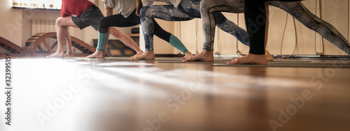 Aerobic Pilates in a gym, group class in a row