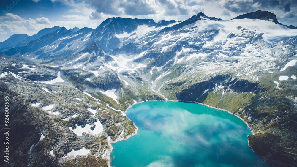 Aerial view of Weißsee Gletscherwelt panorama in national park Hohe Tauren. Austria, Tirol, lake named Weisssee in Kaunertal, Austrian Alps.
