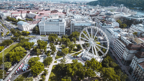 Drone panoramic skyline view of Deák Ferenc square with ferris wheel. photo