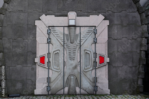 Hallway with a magic door in a spaceship. Metal security doors to a building from a game or fairy tale. Futuristic design