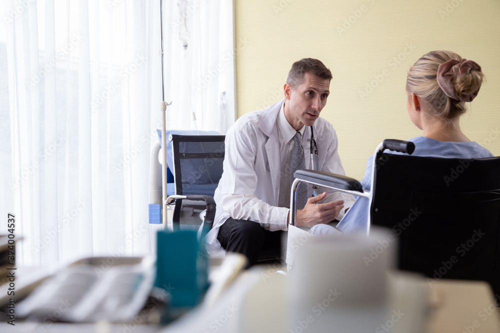 Doctor with patient talking and diagnosing serious illness, Medicine and health care concept Doctor with patient talking and diagnosing serious illness, Medicine and health care concept