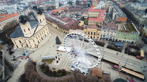 Aerial drone view of carnival with ferris wheel in Debrecen, Hungary.