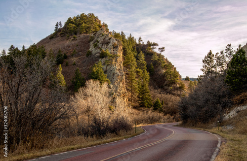 Принти на полотні Beautiful red sandstone rock formation near the road in Roxborough State Park, Denver, Colorado, at sunset