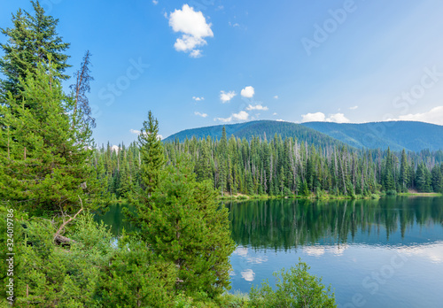 Fototapeta Naklejka Na Ścianę i Meble -  Majestic mountain lake in Canada. Lightning Lake in Manning Park in British Columbia. Lake Trail View.