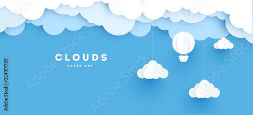 Origami made colorful hot air balloon and cloud.paper art and digital craft style