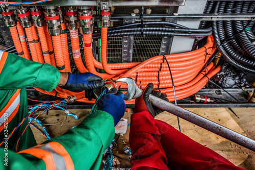 Electrical work onboard production platform construction photo