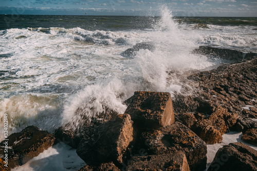 Fototapeta Naklejka Na Ścianę i Meble -  waves on the sea beach on a sunny day